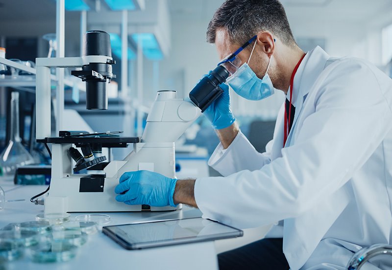 Clinical research specialist examining clinical study samples