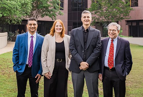 A photo of ARC leadership including Manish M. Naik, MD, Katherine (Katie) Henry, JD, Anas Daghestani, MD, and Norman H. Chenven, MD
